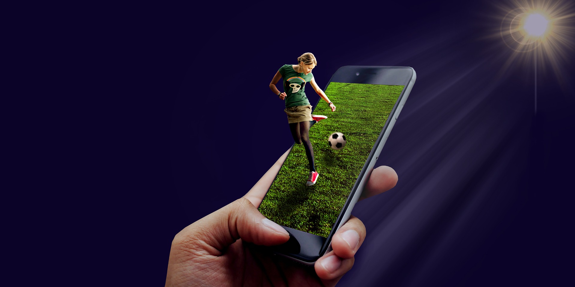 A phone with a female soccer player coming out of it.